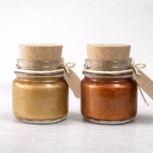 alt="balm iluminador natural encantado manteiga murumuru mica dourada laranja doce Bergo Botica"